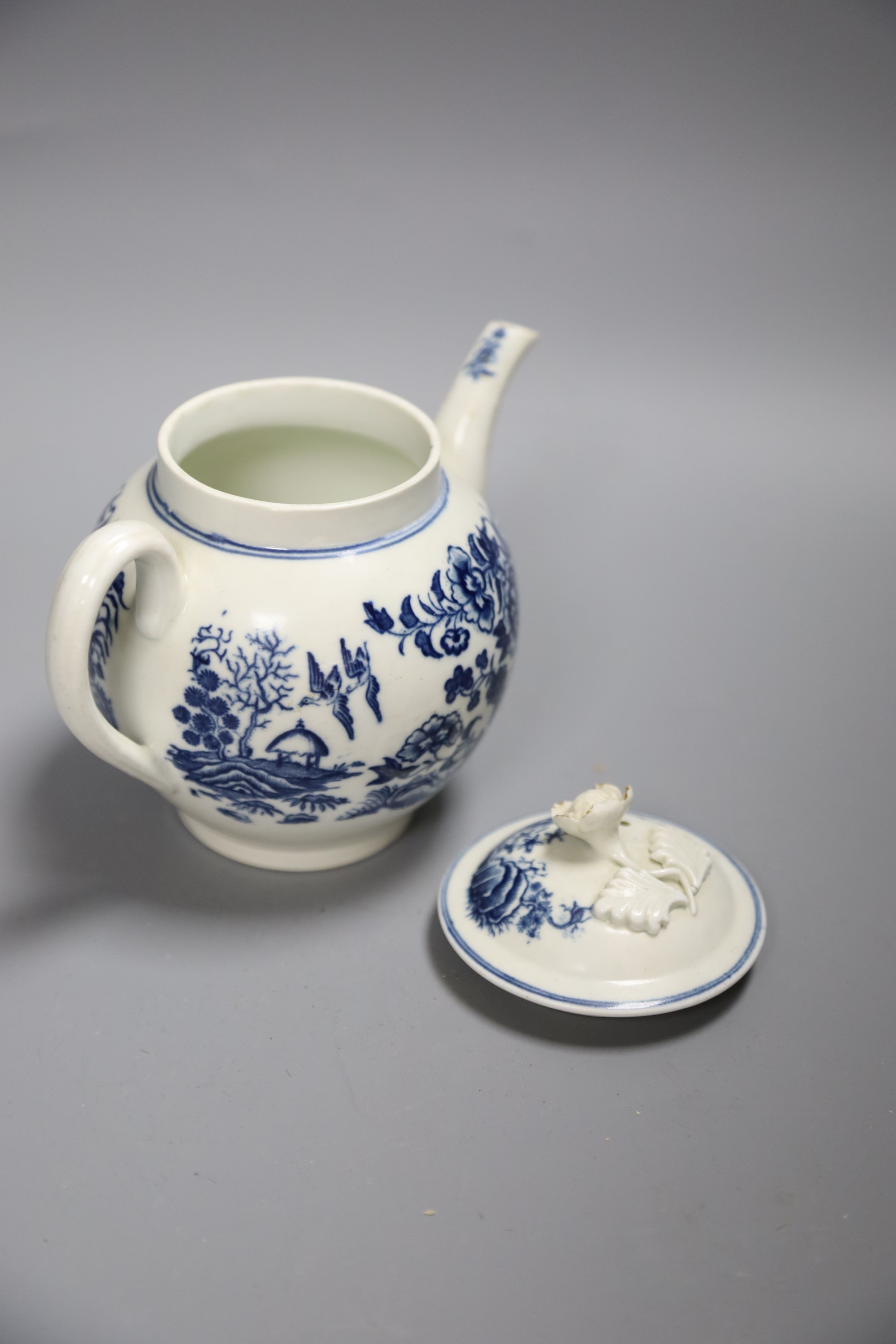 An 18th century Caughley tea pot and cover with the Fence in Blue pattern, C mark to base, height 13cm